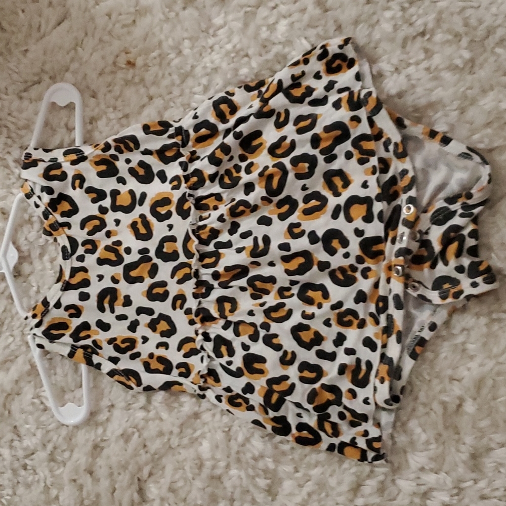 One piece skirt onesie by Spearmint love